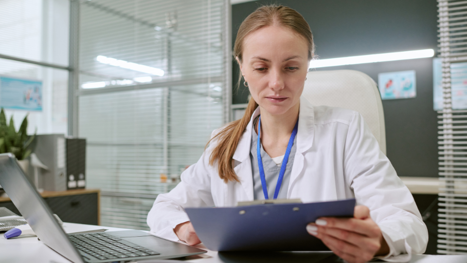 medical professional working at desk