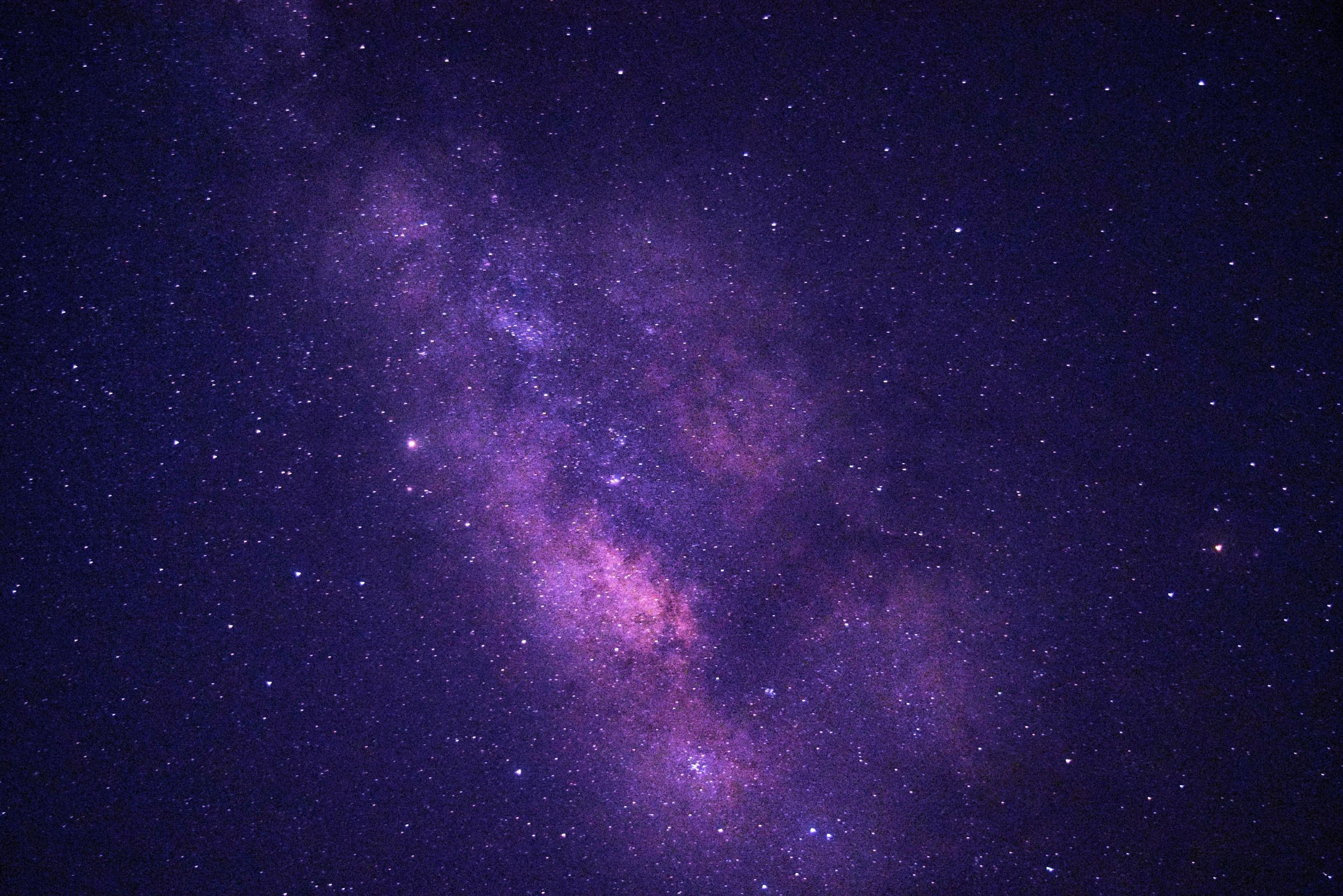 galaxy in outer space, purple tones